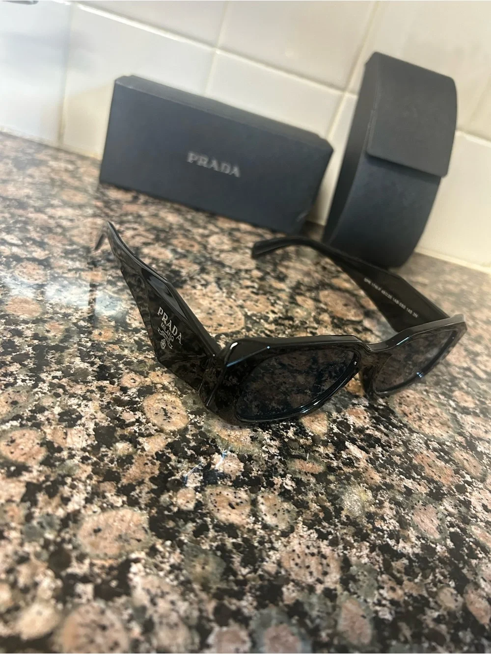 Prada Black Cat-Eye unisex Sunglasses